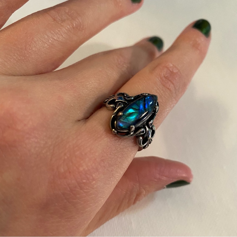 Silver Tone Costume Jewelry Ring with Blue Swirl Jewel Design